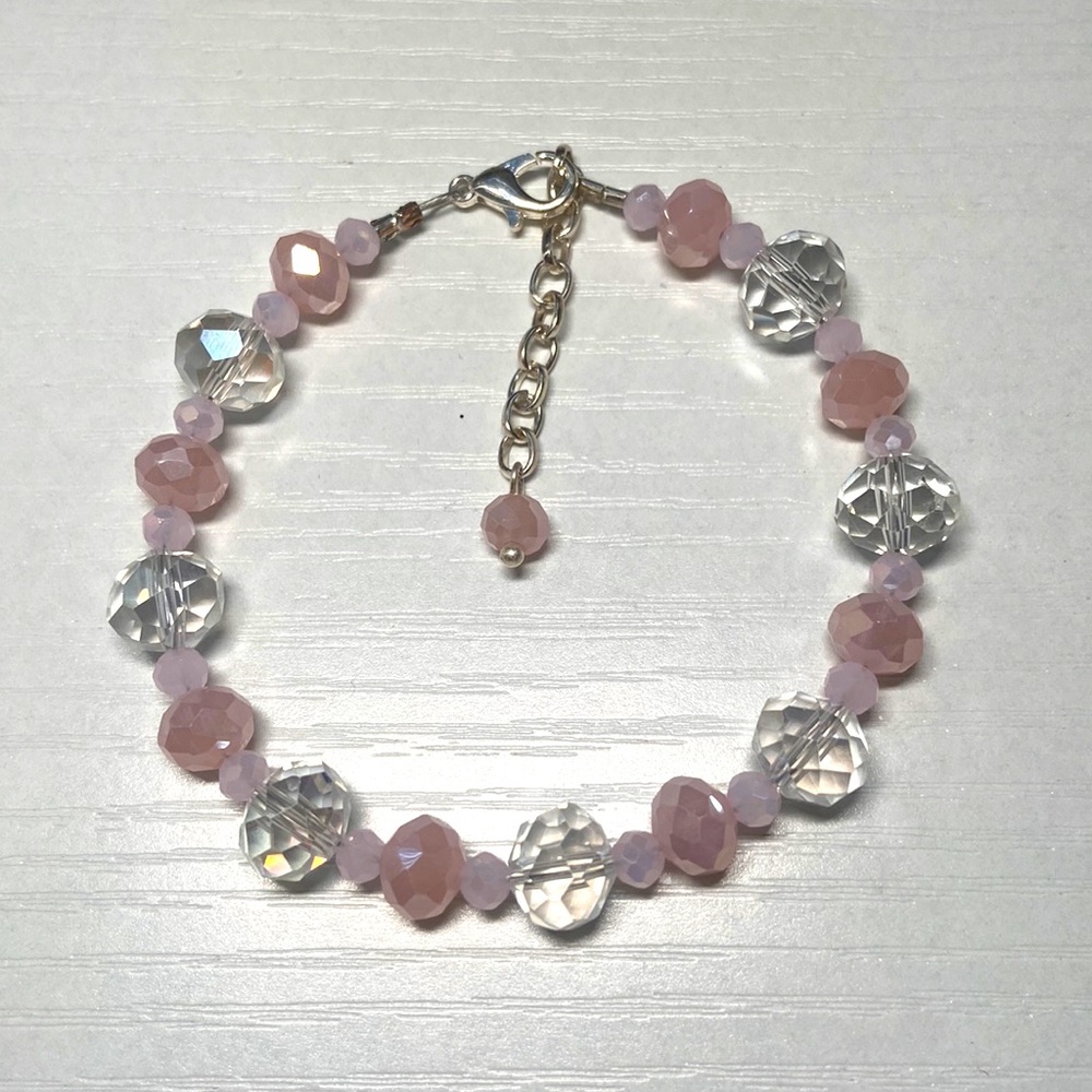 Light pink and clear glass beaded handmade bracelet.